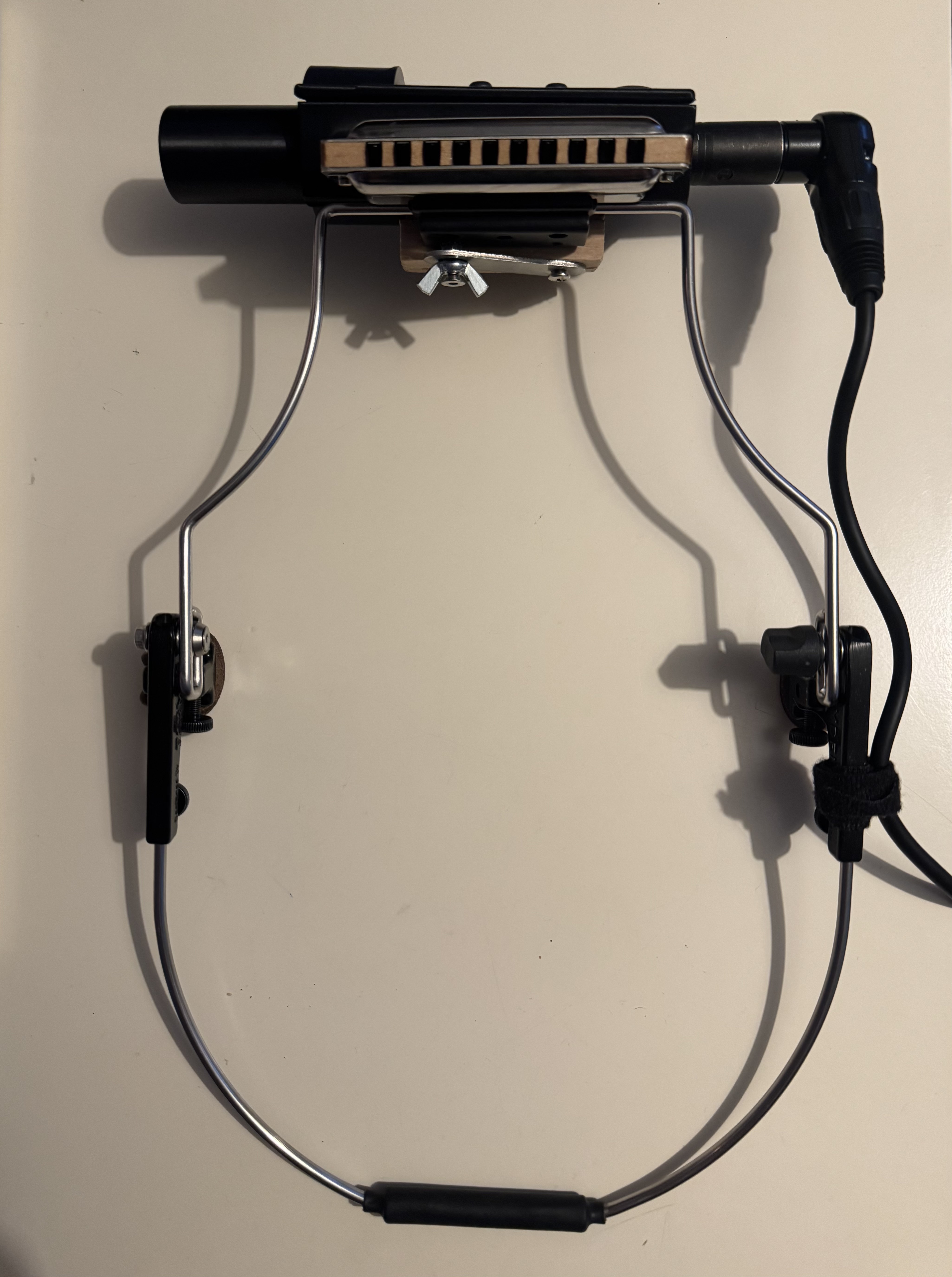 Mic on harmonica in a stand